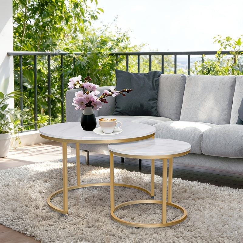 Set of Two Circular Nesting Tables Featuring a White Faux Marble Top And a Golden Frame, Perfect for Modern Living Rooms Or Bedrooms with an Industrial Touch