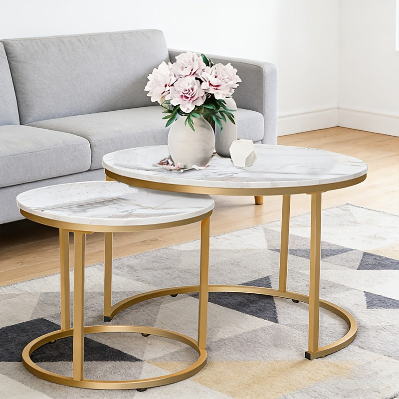 Set of Two Circular Nesting Tables Featuring a White Faux Marble Top And a Golden Frame, Perfect for Modern Living Rooms Or Bedrooms with an Industrial Touch